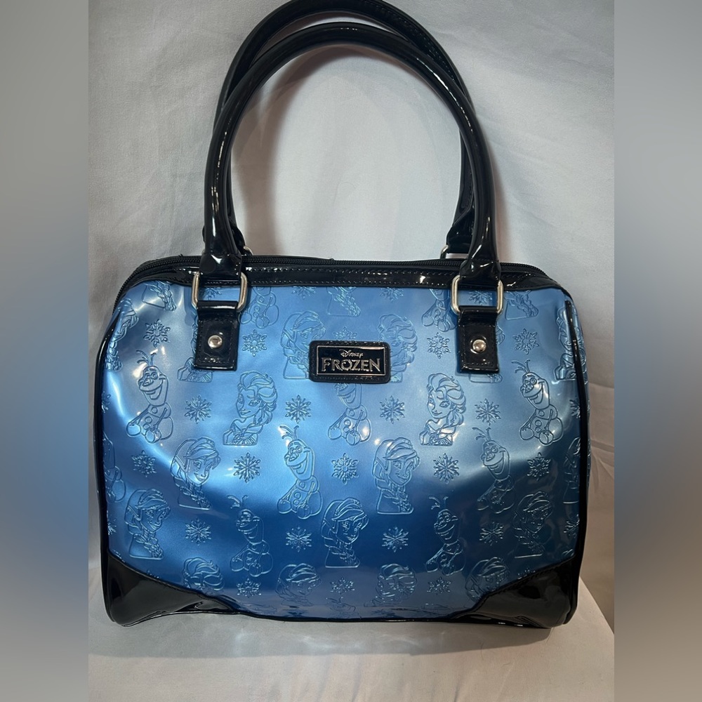 Loungefly Disney’s Frozen character’s AOP black and blue barrel bag
